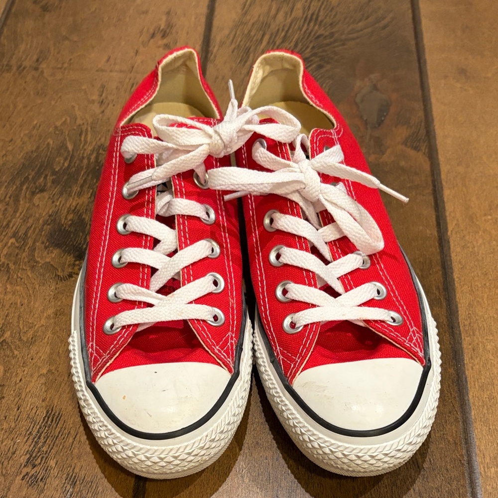 Vibrant, red converses women’s